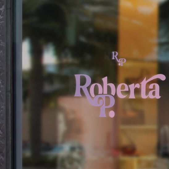 clothing store β logo on display window